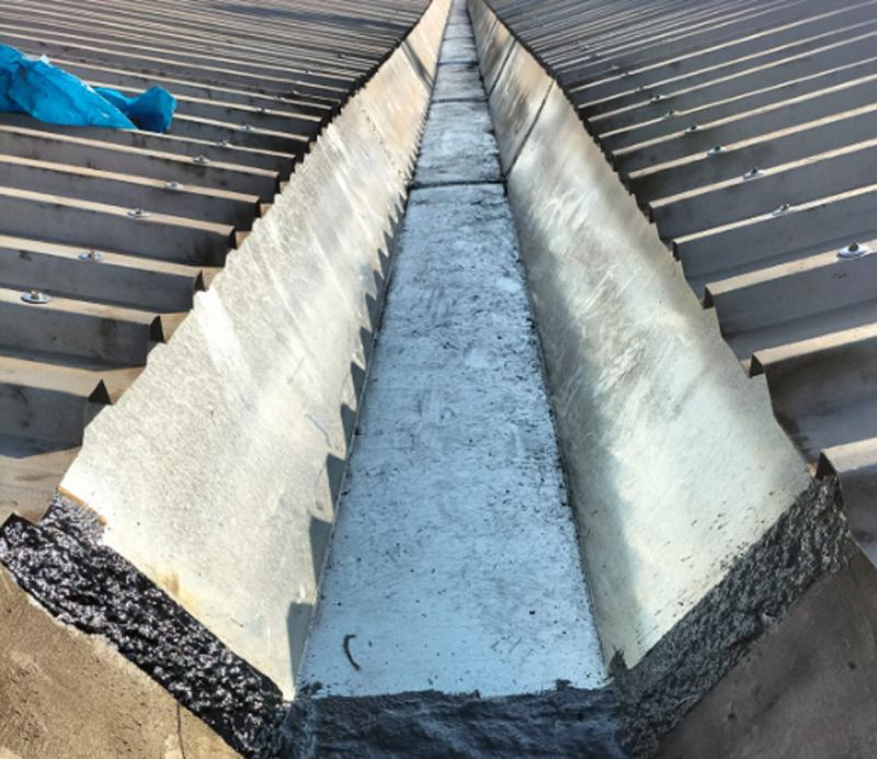 Refurbished box gutter with new coatings